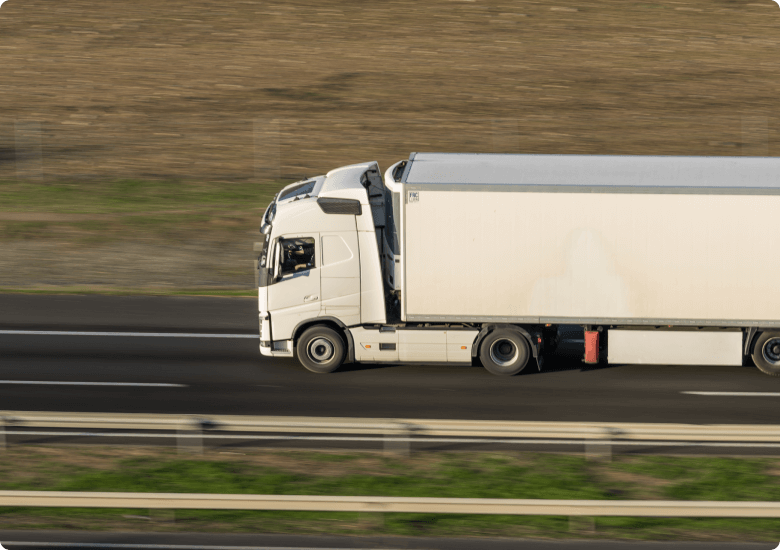 Refer truck driving on a road